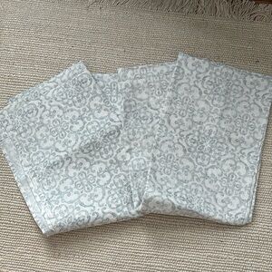 Two sets of window curtains